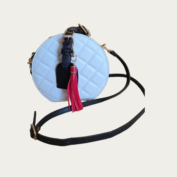 Chic White Quilted Vegan Leather Round Bag with Red Tassel - Picture 7 of 10